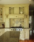 Custom kitchen cabinets by AppWood featuring 1 inch thick inset doors and antique glaze finish
