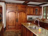 Custom kitchen cabinets by AppWood featuring 1 inch thick inset doors