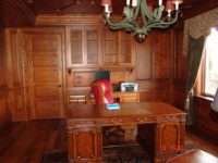 Custom home library shelves and raised panel walls and ceiling by AppWood